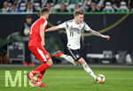 20.03.2019, Fussball, Lnderspiel, Deutschland - Serbien, in der Volkswagen Arena Wolfsburg. (L-R) Uros Spajic (Serbien) gegen Marco Reus (Deutschland)


