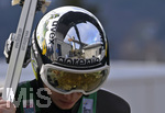28.12.2019, Skispringen Vierschanzentournee Oberstdorf Training an der Schattenbergschanze, Anze Lanisek (Slowenien) auf dem Weg zur Schanze, die sich in seinem Alu-Helm spiegelt.