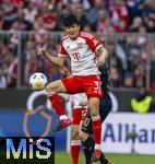 09.03.2024, Fussball 1. Bundesliga 2023/2024, 25.Spieltag, FC Bayern Mnchen - 1.FSV Mainz 05, in der Allianz-Arena Mnchen.  Min-jae Kim (Bayern Mnchen, Minjae Kim) gegen Silvan Widmer (FSV Mainz).


