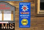 25.03.2024 , Ein Skilift in Grasgehren im Allgu, Bergwacht - Werbeplakat an der Skihtte. Skiwacht im Einsatz.