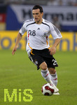 Fussball EM-Qualifikation, Deutschland - Slowakei in Hamburg, 06.06.2007,   Piotr TROCHOWSKI (GER) am Ball.        