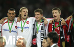 Fussball DFB-Pokal-Finale in Berlin, 26.05.2007,  VfB Stuttgart - 1.FC Nürnberg, Die drei Torschützen liegen sich in den Armen. Marco ENGELHARDT (2. von links), Jan KRISTIANSEN (2. von rechts) und Marek MINTAL (rechts, alle drei Nürnberg). Jaouhar MNARI (li, Nürnberg).