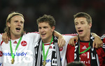 Fussball DFB-Pokal-Finale in Berlin, 26.05.2007,  VfB Stuttgart - 1.FC Nürnberg, Die drei Torschützen liegen sich in den Armen. Marco ENGELHARDT (li), Jan KRISTIANSEN (mitte) und Marek MINTAL (re, alle drei Nürnberg).