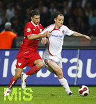Fussball DFB-Pokal-Finale in Berlin, 26.05.2007,  VfB Stuttgart - 1.FC Nürnberg, Markus SCHROTH (re, Nürnberg) gegen Matthieu DELPIERRE (li, Stuttgart).