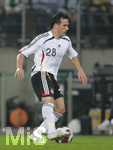 Fussball EM-Qualifikation, Deutschland - Slowakei in Hamburg, 06.06.2007,   Piotr TROCHOWSKI (GER) am Ball.