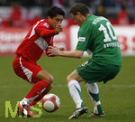 1. Bundesliga Herren, 25.Spieltag im Gottlieb-Daimler-Stadion, VfB Stuttgart - VFL Wolfsburg, Ricardo OSORIO (li, Stuttgart) gegen Jacek KRZYNOWEK (re, Wolfsburg).