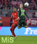 21.12.2019, Fussball 1. Bundesliga 2019/2020, 17.Spieltag, FC Bayern Mnchen - VfL Wolfsburg, in der Allianz-Arena Mnchen. v.l. David Alaba (FC Bayern Mnchen) gegen Felix Klaus (Wolfsburg)   


