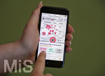 23.02.2020, Coronavirus-Flle auf einer interaktiven Deutschland-Karte auf einem Smartphone.