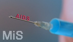 25.03.2020, Symbolbild: Impfung gegen AIDS