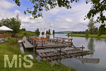 30.07.2020, Lechbruck am See im Allgu, Sommerurlaub in der Heimat. Am Ufer liegt ein Flo befestigt, das man fr eine Gruppenfahrt ber den Lech buchen kann.