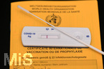 05.03.2021, Impfen, Symbolbild, ein Impfpass ausgegeben von der WHO. Weltgesundheitsorganisation mit einem COVID-19 Antigen-Testkit (Schnelltest) zum Eigentest im Privat-Einsatz. Der Corona Antigen Test ist ein Test zum qualitativen Nachweis von Nukleocapsid Protein Antigen aus SARS-CoV-2 in nasalen Tupferproben von Personen, die im Verdacht stehen, sich mit COVID-19 infiziert zuhaben. Der Test dient der Untersttzung der schnellen Diagnose einer SARS-CoV-2 Infektion. Die Anzeige zeigt das Ergebnis: Negativ.  