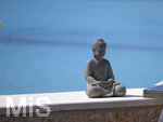 09.06.2021, Beliebtes Reiseziel der Deutschen, Mallorca.   EIne Buddha-Statue in Cala Ratjada, an der Promenade am Meer. 