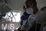 20.07.2021, Reisen und Fliegen in Zeiten der Corona-Pandemie, Passagiere mit FFP2-Maske auf dem Flug eines Condor-Passagier-Flugzeuges von der Rückreise aus Mallorca. (Modelreleased)