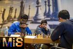 07.03.2023, Das 38. Internationale ChessOrg-Schachfestival in Bad Wörishofen (Bayern). Die Elite der Schach-Szene aus fast der ganzen Welt kämpft an den Tischen um Weltranglistenpunkte und Preisgelder. Mehrere Großmeister aus Indien sind die aussichtsreichsten Akteure. 
Links am Tisch: Großmeister Visakh NR (Indien, Blaue Jacke) brütet über sein Schachbrett, rechts sein Gegner der erst 16-Jährige Großmeister aus Indien Leon Luke Mendonca (Hamburger SK) 