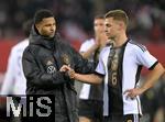 21.11.2023, Fussball, Lnderspiel, Testspiel 2023/24, sterreich - Deutschland, im Ernst Happel Stadion Wien,    v.l. Serge Gnabry (Deutschland) trstet Josua Kimmich (Deutschland) 

