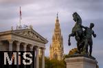 21.11.2023, sterreich, die Hauptstadt Wien. Impressionen vom sterreichischen Regierungsgebude, dem Parlament (links), re: Pallas-Athene-Brunnen, Mitte: hinter den Bumen das Rathausgebude.