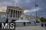 21.11.2023, sterreich, die Hauptstadt Wien. Impressionen vom sterreichischen Regierungsgebude, dem Parlament, mitte: Pallas-Athene-Brunnen, Die sterreichische Nationalflagge mit dem Bundesadler weht im Wind.