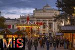 21.11.2023, sterreich, die Hauptstadt Wien. Impressionen vom Weihnachtsmarkt am Rathausplatz, hinten das Burgtheater. 