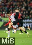 10.02.2024, Fussball 1. Bundesliga 2023/2024, 21. Spieltag, Bayer 04 Leverkusen - FC Bayern Mnchen, in der BayArena Leverkusen. (L-R) Jamal Musiala (Bayern Mnchen) gegen Florian Wirtz (Bayer Leverkusen)


