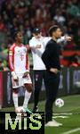 10.02.2024, Fussball 1. Bundesliga 2023/2024, 21. Spieltag, Bayer 04 Leverkusen - FC Bayern Mnchen, in der BayArena Leverkusen. (L-R) Mathys Tel (Bayern Mnchen) und Trainer Thomas Tuchel (Bayern Mnchen)


