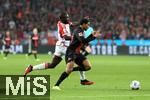 10.02.2024, Fussball 1. Bundesliga 2023/2024, 21. Spieltag, Bayer 04 Leverkusen - FC Bayern Mnchen, in der BayArena Leverkusen. (L-R) Dayot Upamecano (Bayern Mnchen) gegen Amine Adli (Bayer Leverkusen)


