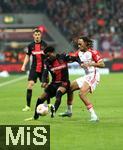 10.02.2024, Fussball 1. Bundesliga 2023/2024, 21. Spieltag, Bayer 04 Leverkusen - FC Bayern Mnchen, in der BayArena Leverkusen. (L-R) Nathan Tella (Bayer Leverkusen) gegen Sacha Boey (Bayern Mnchen)


