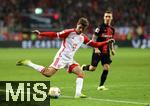 10.02.2024, Fussball 1. Bundesliga 2023/2024, 21. Spieltag, Bayer 04 Leverkusen - FC Bayern Mnchen, in der BayArena Leverkusen. (L-R) Thomas Mller (Bayern Mnchen) gegen Alejandro Grimaldo (Bayer Leverkusen)


