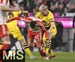 30.03.2024, Fussball 1. Bundesliga 2023/2024, 27.Spieltag, FC Bayern Mnchen - Borussia Dortmund, in der Allianz-Arena Mnchen. hier wird Jamal Musiala (FC Bayern Mnchen) gefoult 

