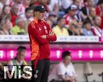 12.05.2024, Fussball 1. Bundesliga 2023/2024, 33.Spieltag, FC Bayern Mnchen - VfL Wolfsburg, in der Allianz-Arena Mnchen. Trainer Thomas Tuchel (FC Bayern Mnchen) nachdenklich 

