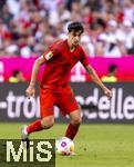 12.05.2024, Fussball 1. Bundesliga 2023/2024, 33.Spieltag, FC Bayern Mnchen - VfL Wolfsburg, in der Allianz-Arena Mnchen. Aleksandar Pavlovic (Bayern Mnchen)  am Ball 

