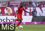 12.05.2024, Fussball 1. Bundesliga 2023/2024, 33.Spieltag, FC Bayern Mnchen - VfL Wolfsburg, in der Allianz-Arena Mnchen. Dayot Upamecano (FC Bayern Mnchen) am Ball 

