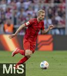 12.05.2024, Fussball 1. Bundesliga 2023/2024, 33.Spieltag, FC Bayern Mnchen - VfL Wolfsburg, in der Allianz-Arena Mnchen. Konrad Laimer (FC Bayern Mnchen) am Ball 

