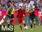 12.05.2024, Fussball 1. Bundesliga 2023/2024, 33.Spieltag, FC Bayern Mnchen - VfL Wolfsburg, in der Allianz-Arena Mnchen. re: Lovro Majer (Wolfsburg) gegen Konrad Laimer (FC Bayern Mnchen) 

