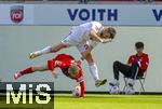 18.05.2024, Fussball 1. Bundesliga 2023/2024, 34.Spieltag, 1.FC Heidenheim - 1.FC Kln, in der Voith-Arena (Heidenheim). Jan Thielmann (oben, Kln) gegen Jan-Niklas Beste (1. FC Heidenheim 1846) 




