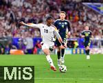 14.06.2024, Fussball UEFA EURO 2024, Vorrunde, 1.Spieltag, Erffnungsspiel Deutschland - Schottland, in der Fuball Arena Mnchen. v.l. Leroy Sane (Deutschland) gegen Scott Mctominay (Schottland) 