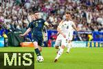 14.06.2024, Fussball UEFA EURO 2024, Vorrunde, 1.Spieltag, Erffnungsspiel Deutschland - Schottland, in der Fuball Arena Mnchen.  v.li: Andrew Robertson (Schottland) gegen Josua Kimmich (Deutschland) 