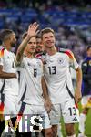 14.06.2024, Fussball UEFA EURO 2024, Vorrunde, 1.Spieltag, Erffnungsspiel Deutschland - Schottland, in der Fuball Arena Mnchen.  Schlussjubel, v.li: Josua Kimmich (Deutschland), Thomas Mller (Deutschland), 