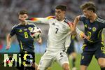 14.06.2024, Fussball UEFA EURO 2024, Vorrunde, 1.Spieltag, Erffnungsspiel Deutschland - Schottland, in der Fuball Arena Mnchen. Kai Havertz (Deutschland) gegen Jack Hendry (re, Schottland) 