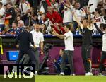 14.06.2024, Fussball UEFA EURO 2024, Vorrunde, 1.Spieltag, Erffnungsspiel Deutschland - Schottland, in der Fuball Arena Mnchen. Das Trainergespann jubelt, Trainer Julian Nagelsmann (li, Deutschland), Co-Trainer Sandro Wagner (Deutschland), Benjamin Glck (re)