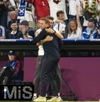 14.06.2024, Fussball UEFA EURO 2024, Vorrunde, 1.Spieltag, Erffnungsspiel Deutschland - Schottland, in der Fuball Arena Mnchen. Jubelumarmung von Trainer Julian Nagelsmann (Deutschland) mit Co-Trainer Sandro Wagner (Deutschland).