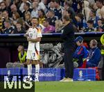 14.06.2024, Fussball UEFA EURO 2024, Vorrunde, 1.Spieltag, Erffnungsspiel Deutschland - Schottland, in der Fuball Arena Mnchen. li: Thomas Mller (Deutschland) lacht mit Trainer Julian Nagelsmann (Deutschland) 