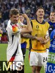 14.06.2024, Fussball UEFA EURO 2024, Vorrunde, 1.Spieltag, Erffnungsspiel Deutschland - Schottland, in der Fuball Arena Mnchen.  Thomas Mller (Deutschland) zeigt seine Beule am Bizeps nach dem Spiel.