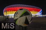 14.06.2024, Fussball UEFA EURO 2024, Vorrunde, 1.Spieltag, Erffnungsspiel Deutschland - Schottland, in der Fuball Arena Mnchen. Das Stadion ist aussen mit den Landesflaggen (Deutschland und Schottland) illuminiert.  Der EM-Ball steht berdimensional vor dem Stadion.