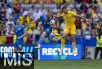 17.06.2024, Fussball UEFA EURO 2024, Vorrunde, Match 10, Rumnien - Ukraine, in der Fuball Arena Mnchen. v.li: Ilya Zabarnyi (Ukraine), Volodymyr Brazhko (Ukraine), Adrian Rus (Rumnien) 

