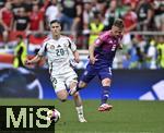 19.06.2024, Fussball UEFA EURO 2024, Vorrunde, 2.Spieltag, Deutschland - Ungarn, in der Stuttgart Arena. v.l. Roland Sallai (Ungarn) gegen Josua Kimmich (Deutschland) 

