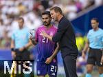 19.06.2024, Fussball UEFA EURO 2024, Vorrunde, 2.Spieltag, Deutschland - Ungarn, in der Stuttgart Arena. Trainer Julian Nagelsmann (Deutschland) flstert Ilkay Gndogan (Deutschland) was ins Ohr

