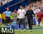 19.06.2024, Fussball UEFA EURO 2024, Vorrunde, 2.Spieltag, Deutschland - Ungarn, in der Stuttgart Arena. v.li: Vierter Offizieller Serdar Gzbyk (NED), Co-Trainer Sandro Wagner (Deutschland), Trainer Julian Nagelsmann (Deutschland) 

