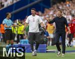 19.06.2024, Fussball UEFA EURO 2024, Vorrunde, 2.Spieltag, Deutschland - Ungarn, in der Stuttgart Arena. v.li: Vierter Offizieller Serdar Gzbyk (NED), Co-Trainer Sandro Wagner (Deutschland), Trainer Julian Nagelsmann (Deutschland) 

