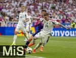 19.06.2024, Fussball UEFA EURO 2024, Vorrunde, 2.Spieltag, Deutschland - Ungarn, in der Stuttgart Arena. Kai Havertz (Deutschland) gegen Bendeguz Bolla (Ungarn) 

