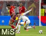 23.06.2024, Fussball UEFA EURO 2024, Vorrunde, 3.Spieltag, Schweiz - Deutschland, in der Frankfurt-Arena in Frankfurt am Main, v.li: Dan Ndoye (Schweiz) gegen Jamal Musiala (Deutschland) 
